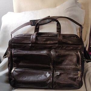 Brown leather briefcase 17" wide 12" tall , handles 17",crossbody 36" st…